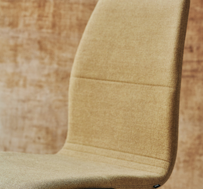 A close-up image of the shell of the AS100 upholstered chair