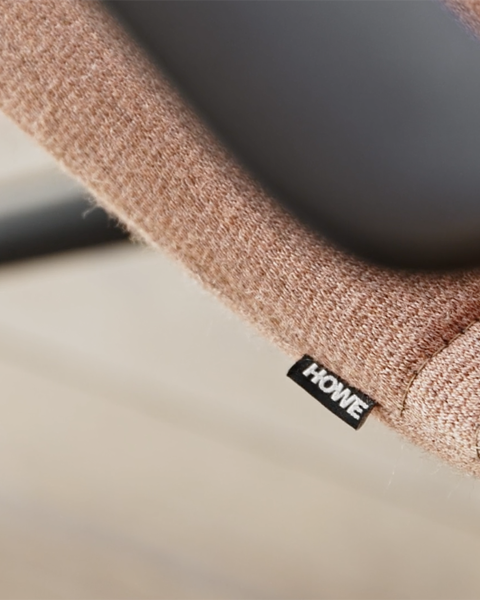 A close-up image of the armrest of the AS100 chair