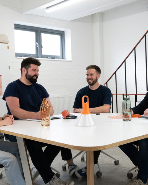 Jones and Partners team seating at a table