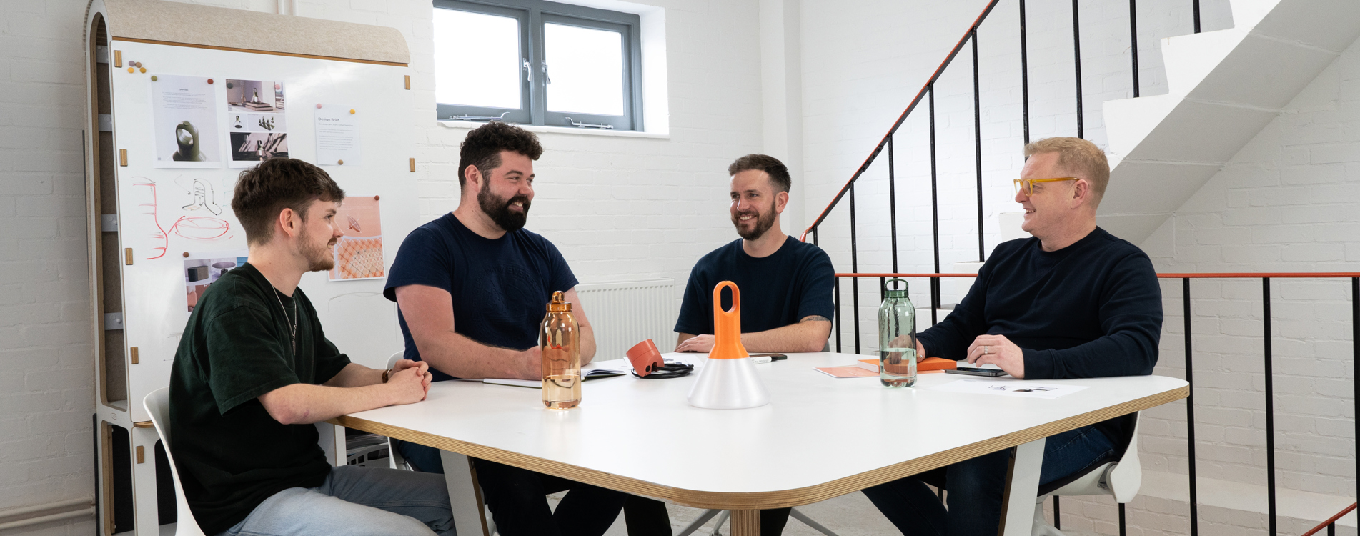 Jones and Partners team seating at a table