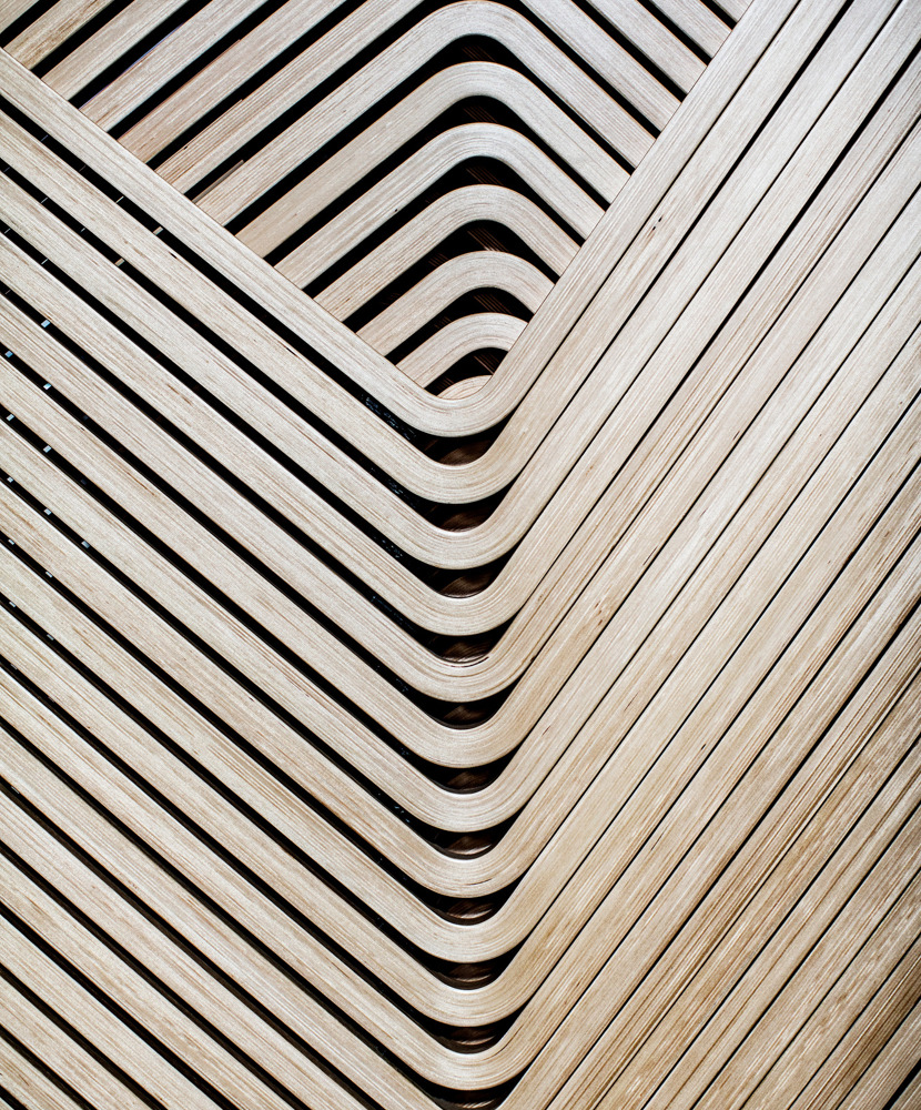 A close-up image of a stack of wooden 40/4 frames