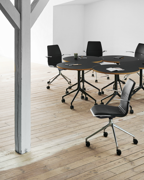 An installation of AS100 and AS400 tables with chrome bases 