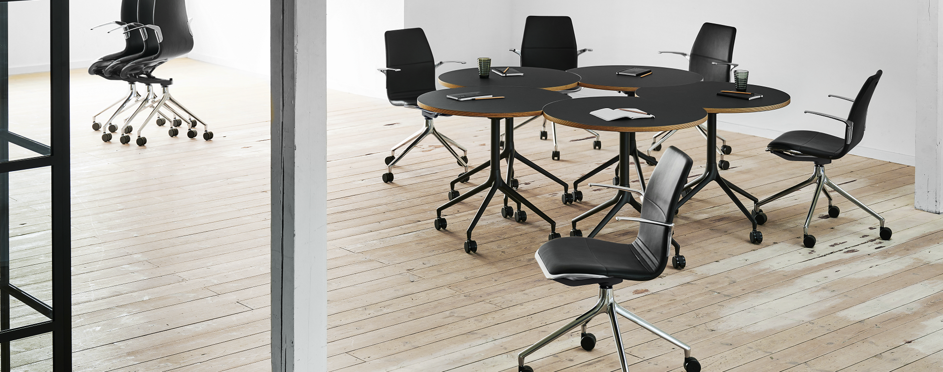 An installation of AS100 and AS400 tables with chrome bases