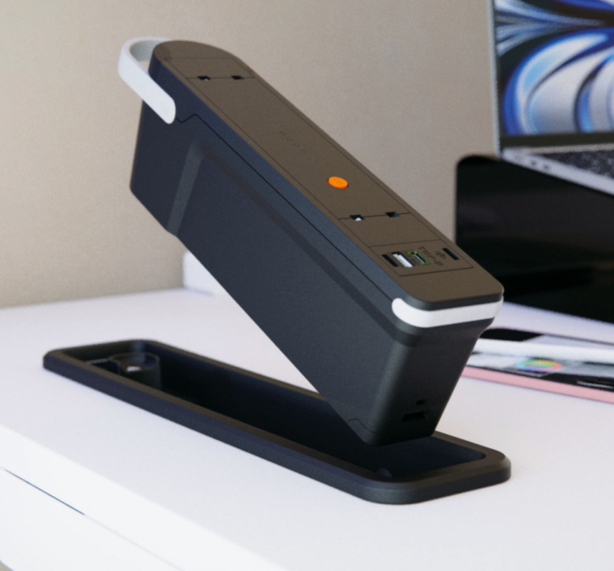 A close-up image of a white tabletop with a built-in battery