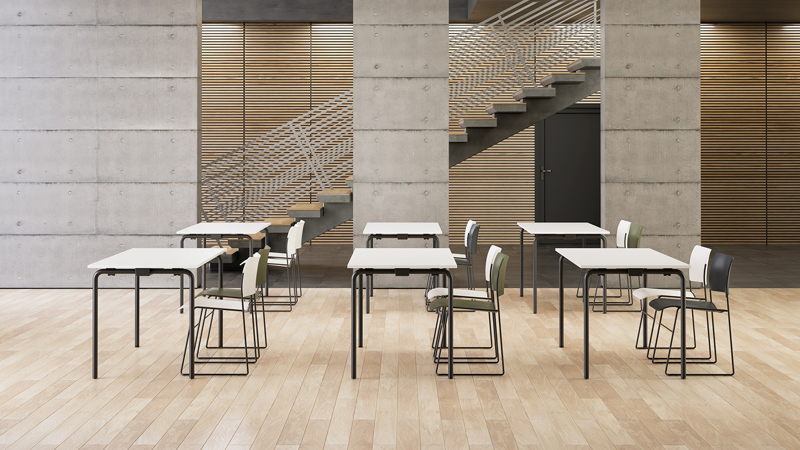 An istallation of the 40/4 chairs and Usu tables with black legs and white table tops