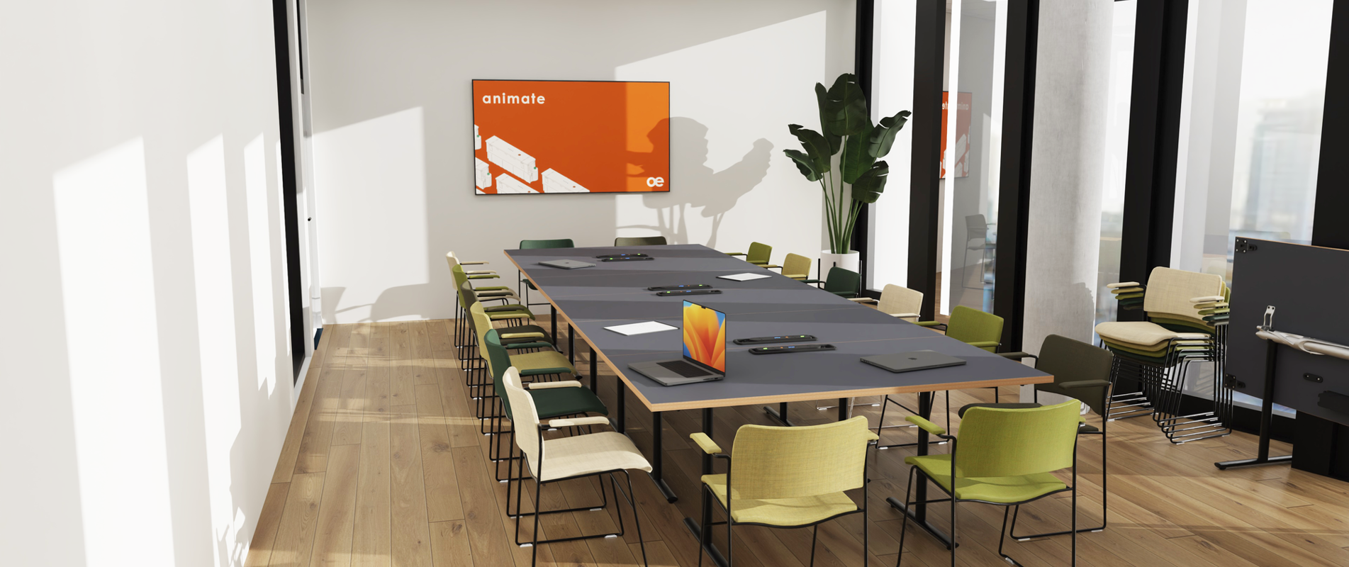 An installation image featuring the Tempest table accompanied by greenish 40/4 chairs